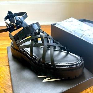 New in box, black faux leather strappy platform sandals US 10 (Nasty Gal)